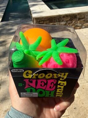 Needoh Groovy Fruit Set - Bright Orange, Strawberry, and Banana.